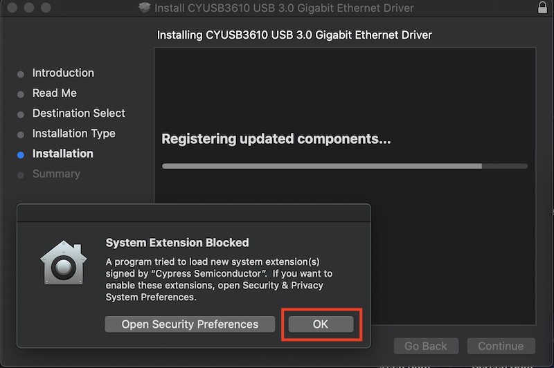 A system alert letting the user know that the System Extension has been blocked, highlighting the 'OK' button.